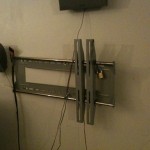 TV pried off the wall to defeat the padlock I had on it